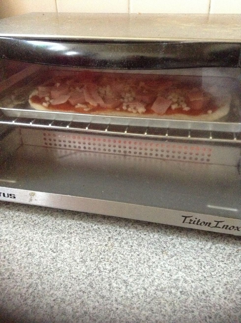 Put it in the oven at 200 degrees until dough is cooked