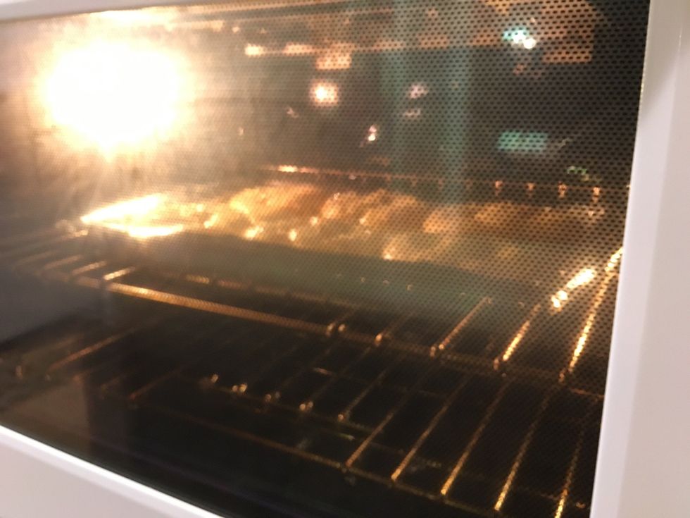 Put it in the oven for 10 min at 425 degrees Fahrenheit or 190 degrees Celsius. When done, put at broil for about 2 min. Remember to keep them on the top rack.