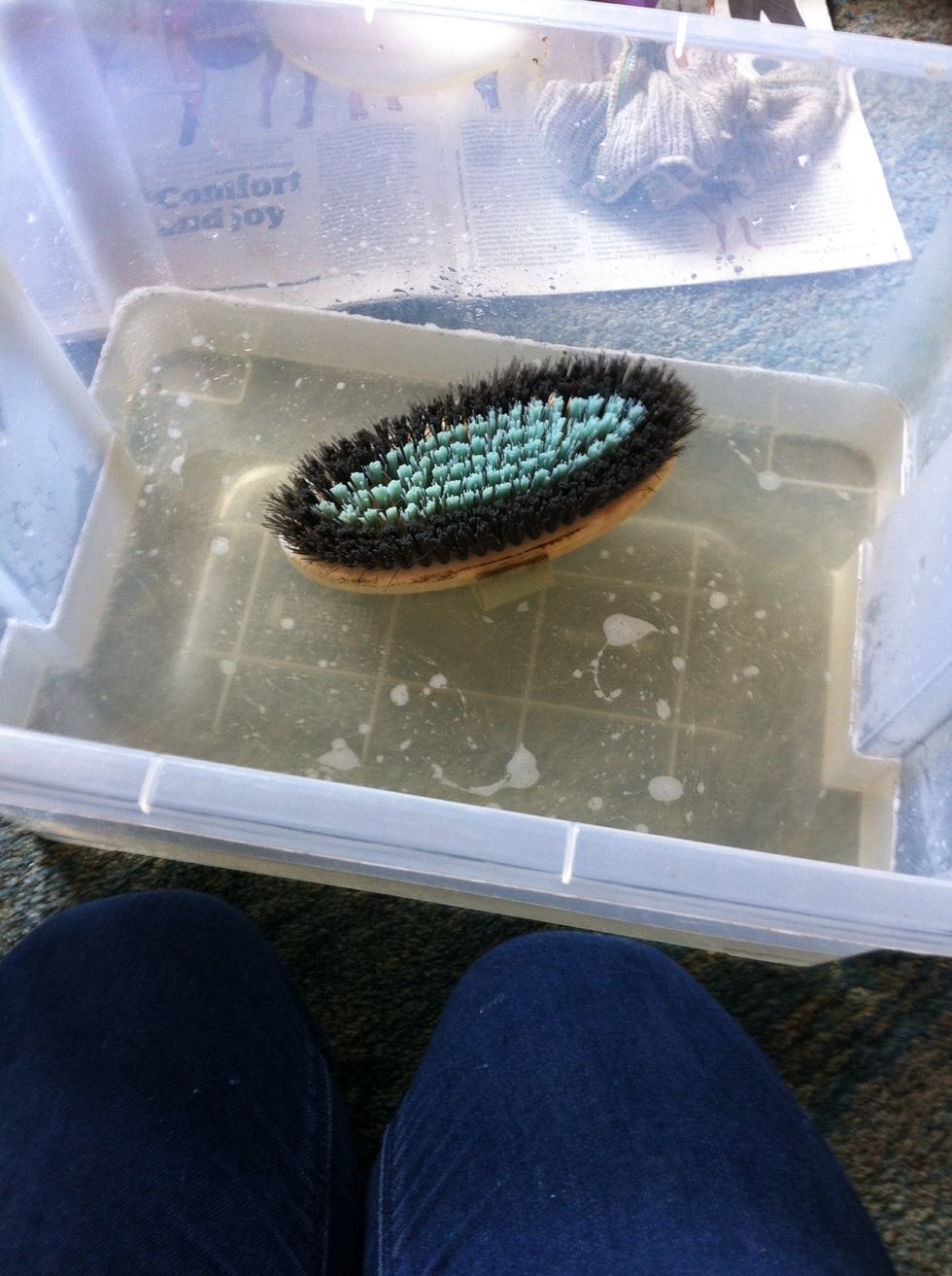 Put it in your bucket of water (with or without lavender) and rinse any exess soapy bits off. Again, not for wooden backs