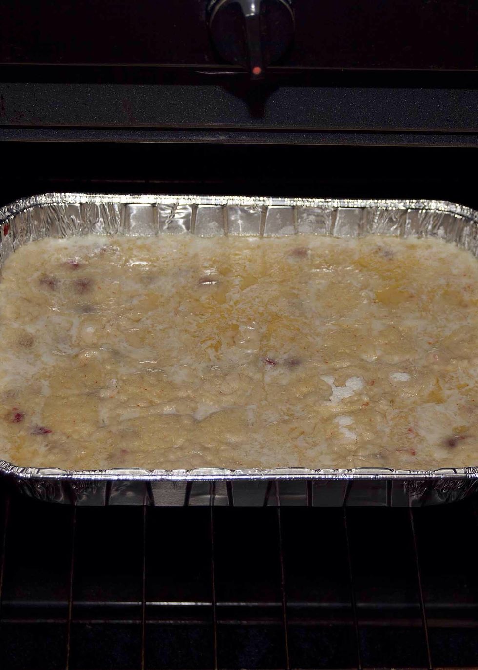 Put it in your preheated oven.  This is about 10 minutes thru. All the butter has melted.