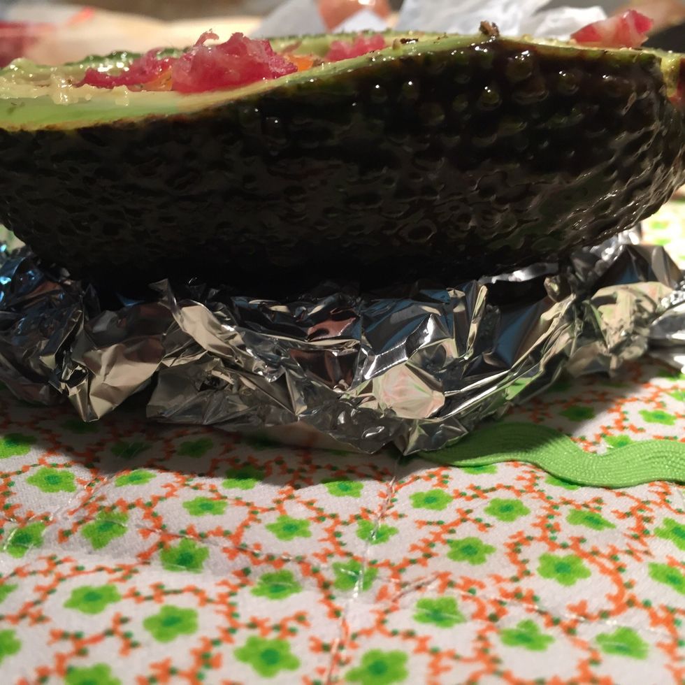 Put it into the oven - 180 celsius degrees / 15 min more or less. I put the avocado in aluminum foil to make it stable