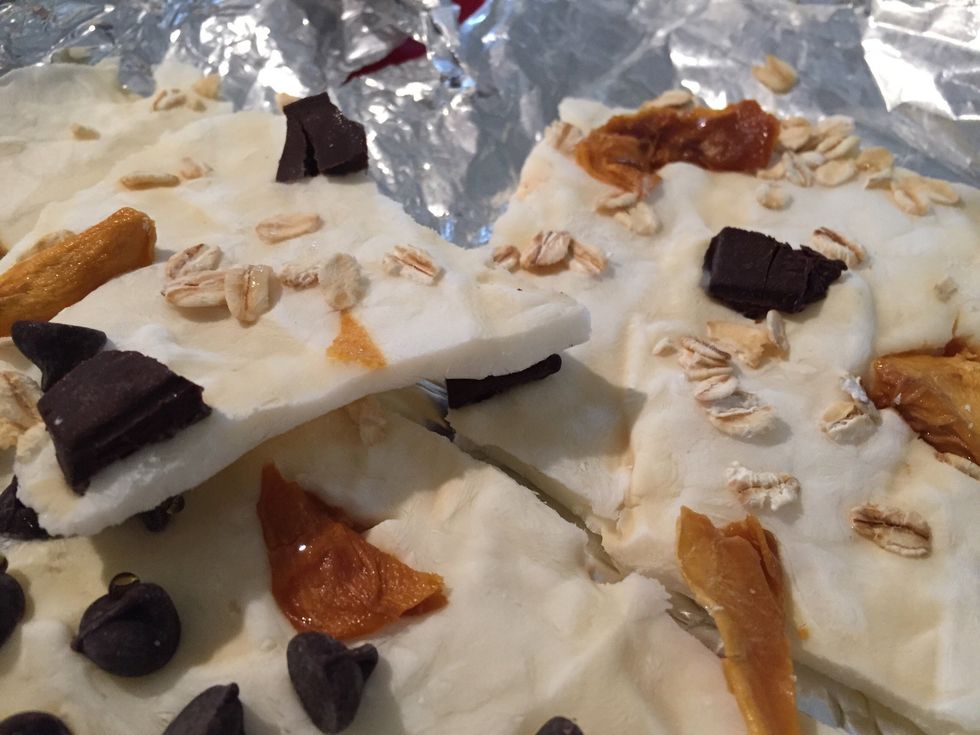 Put it on a flat surface in the freezer. After it has frozen solid, peel back the aluminum foil and break the bark into smaller pieces.