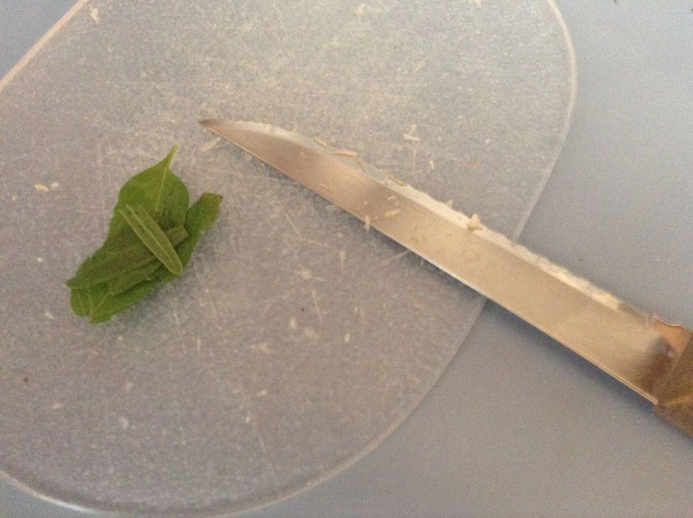 Put it on the same cutting board using the same knife, in a nice little bunch of leaves.
