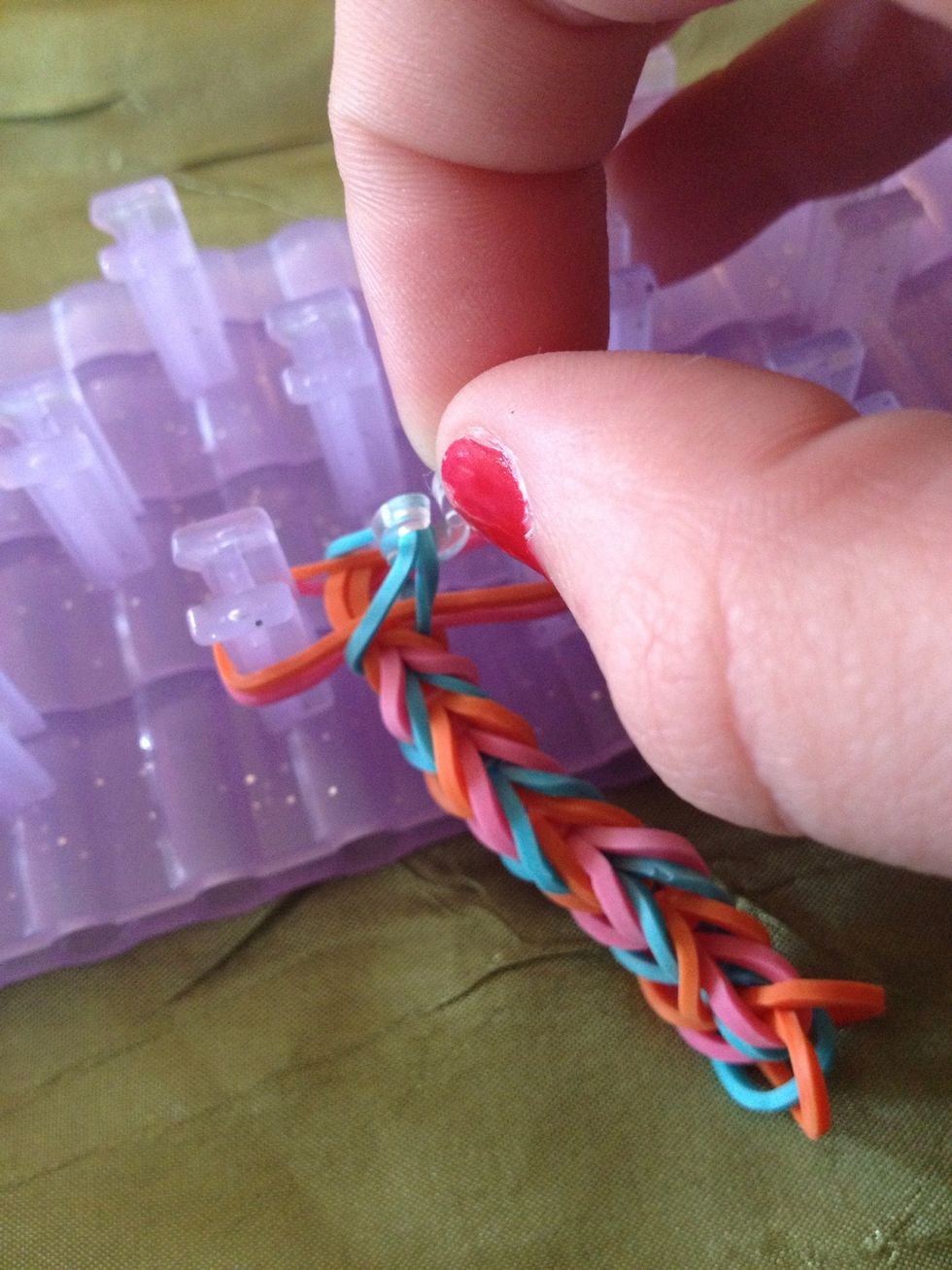 Put it on the two bands in the middle