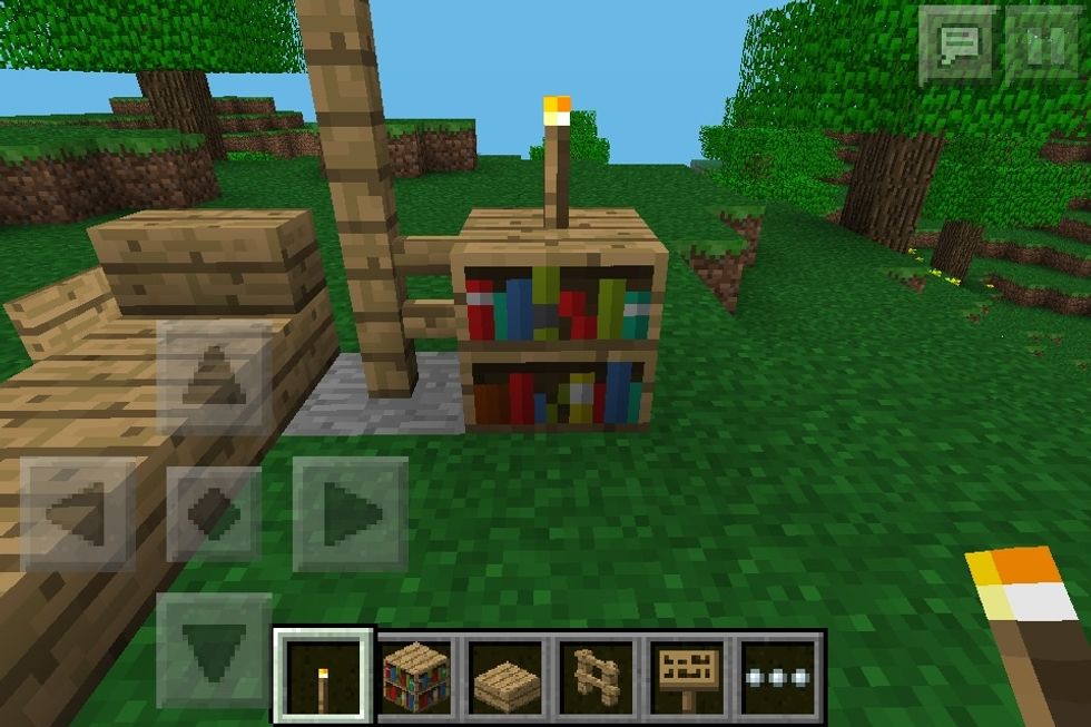 Put it on top of the book shelf and then ur done!