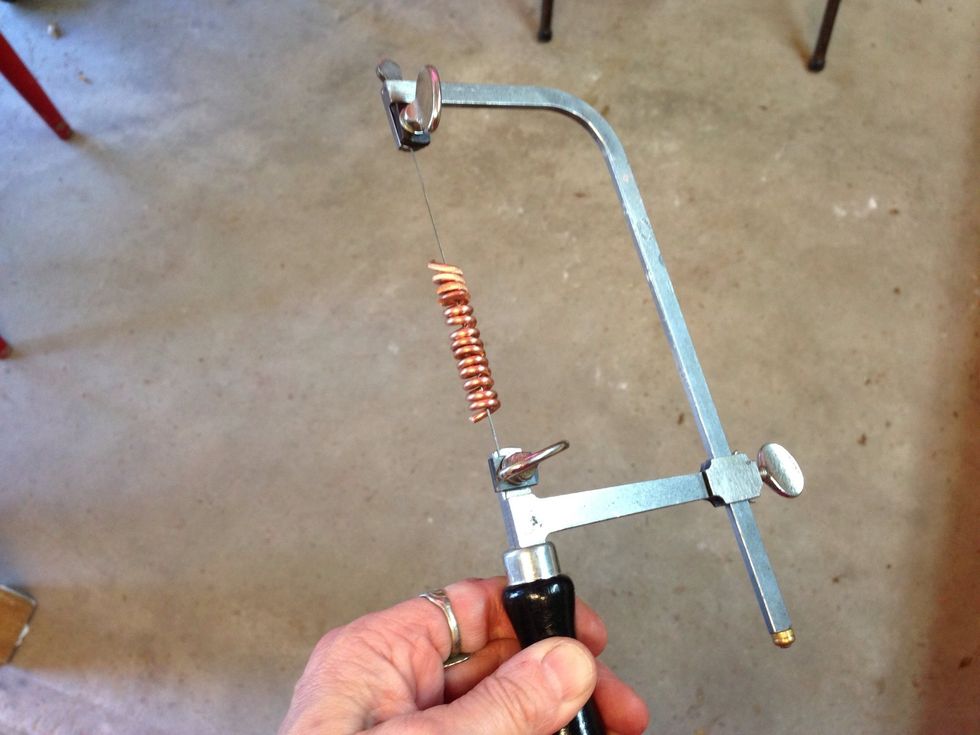 Put it ON your saw blade, and saw your way OUT.