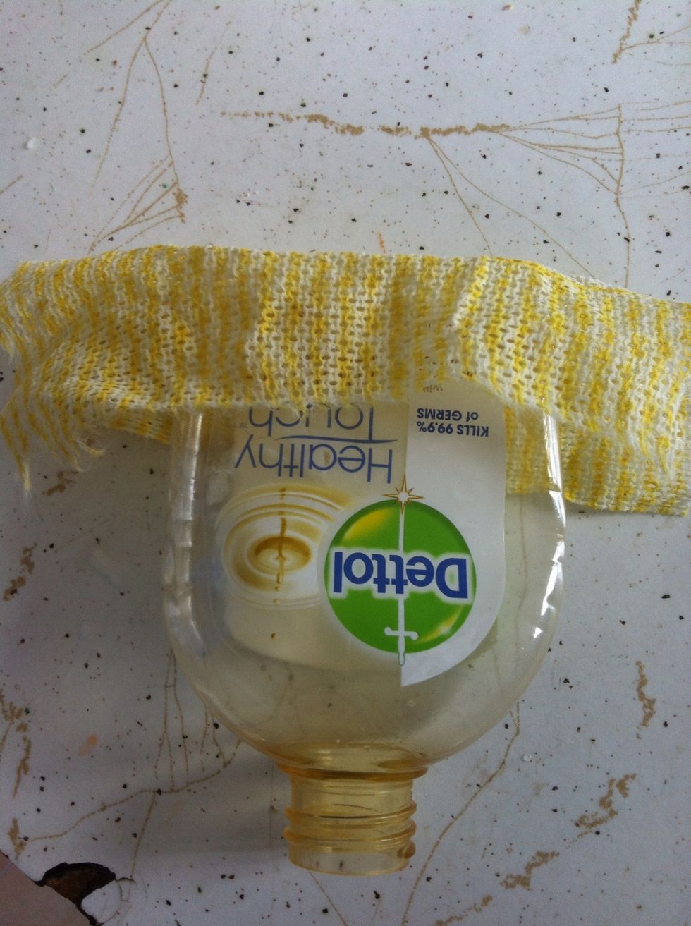 Put it over the end off the bottle