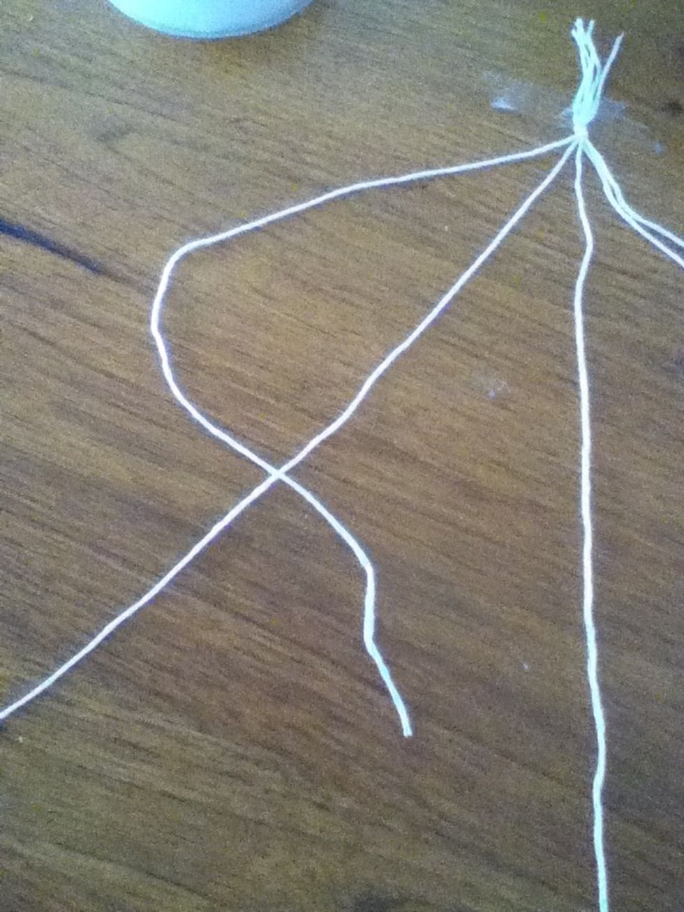 Put it over the second string so it looks like a four