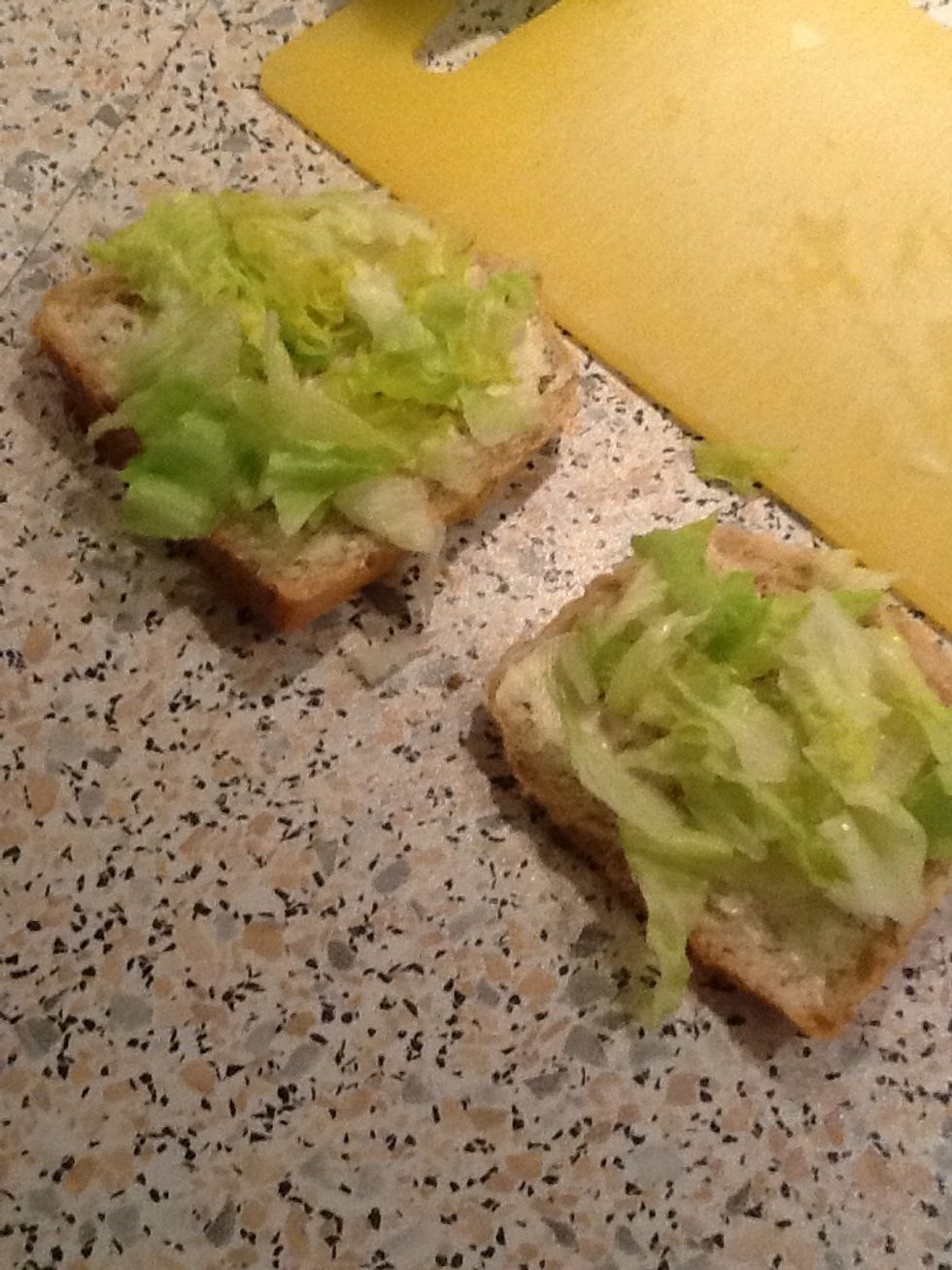 Put it \u00f3n the bread. :)