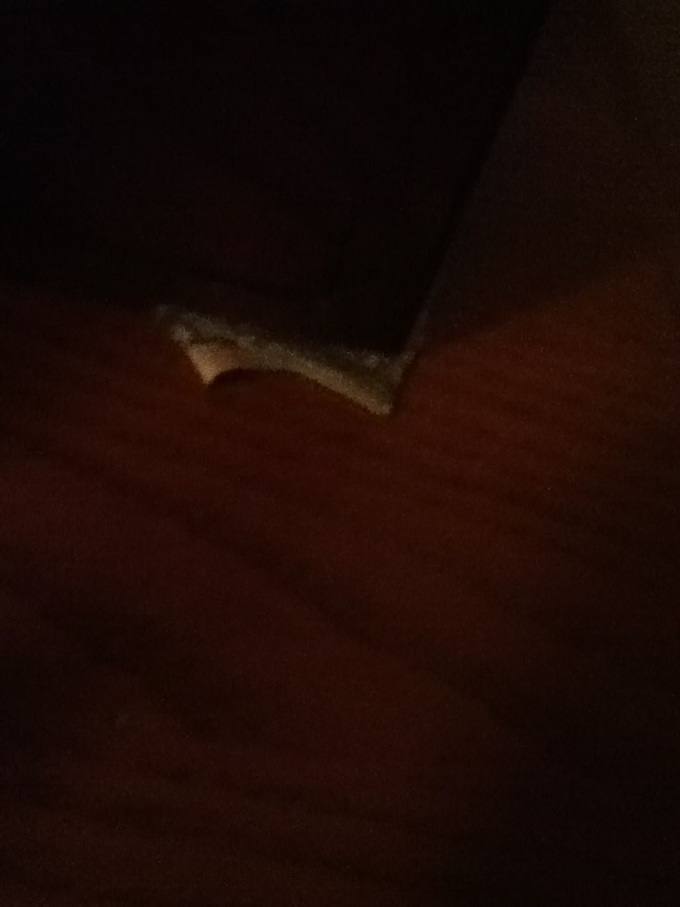 Put it under something heavy to flatten it