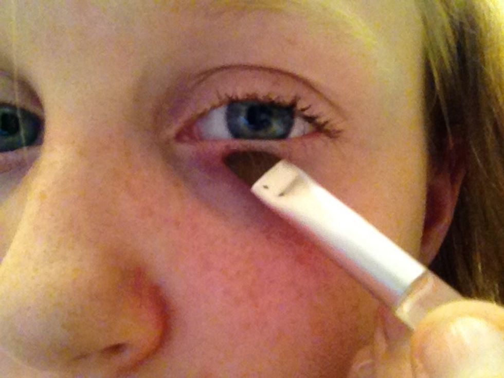 Put it under your eye. Right under the eye lid.