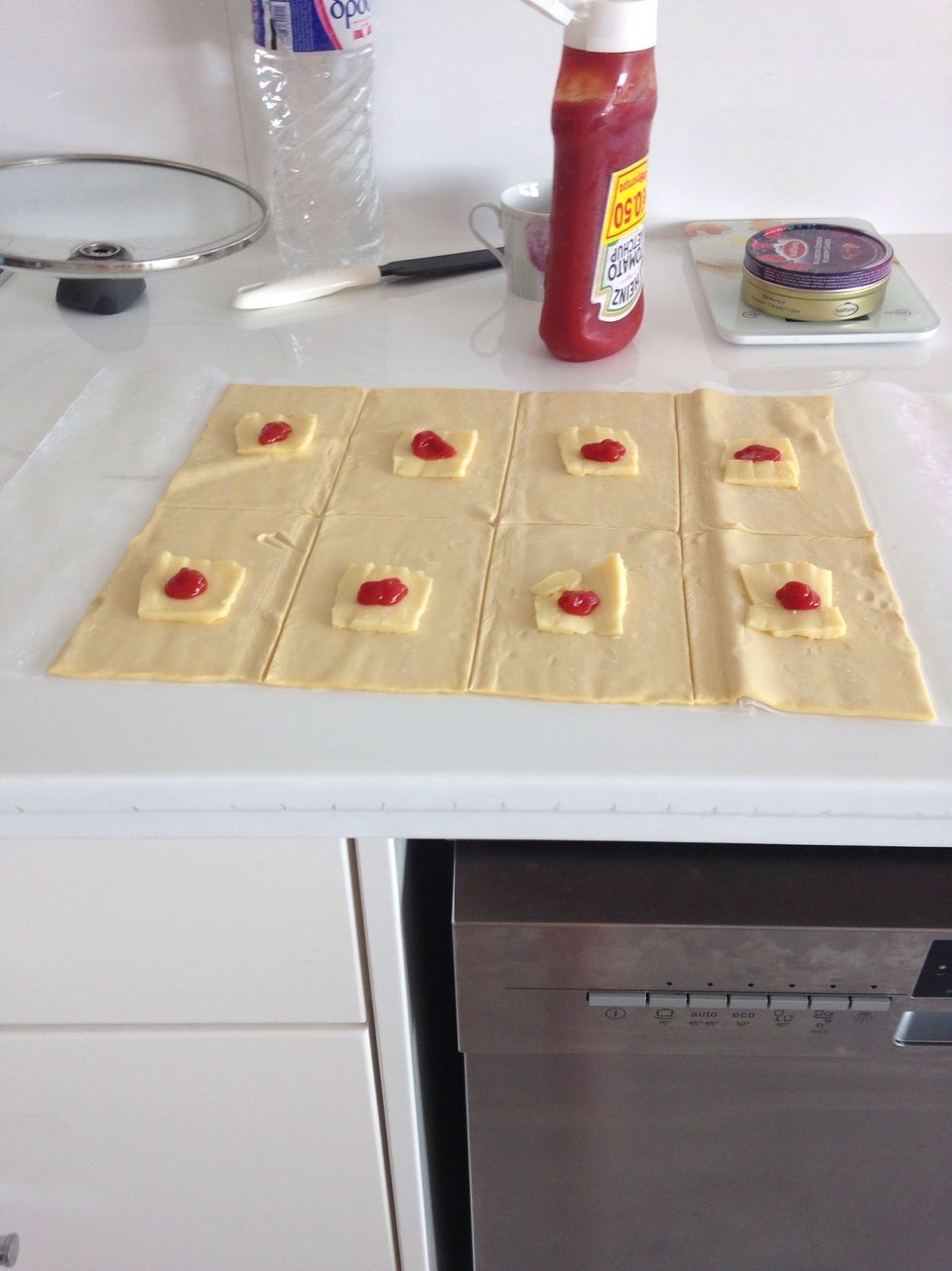 Put ketchup on the cheese