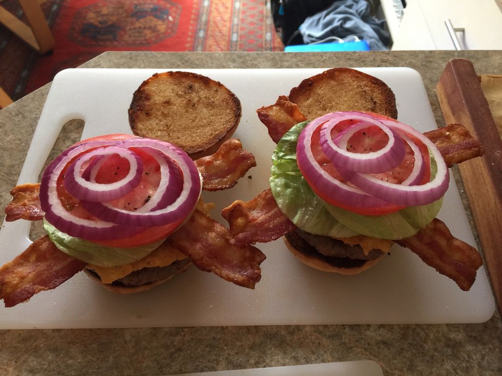 Put lettuce, tomato, red onion on bacon and salt and pepper to taste