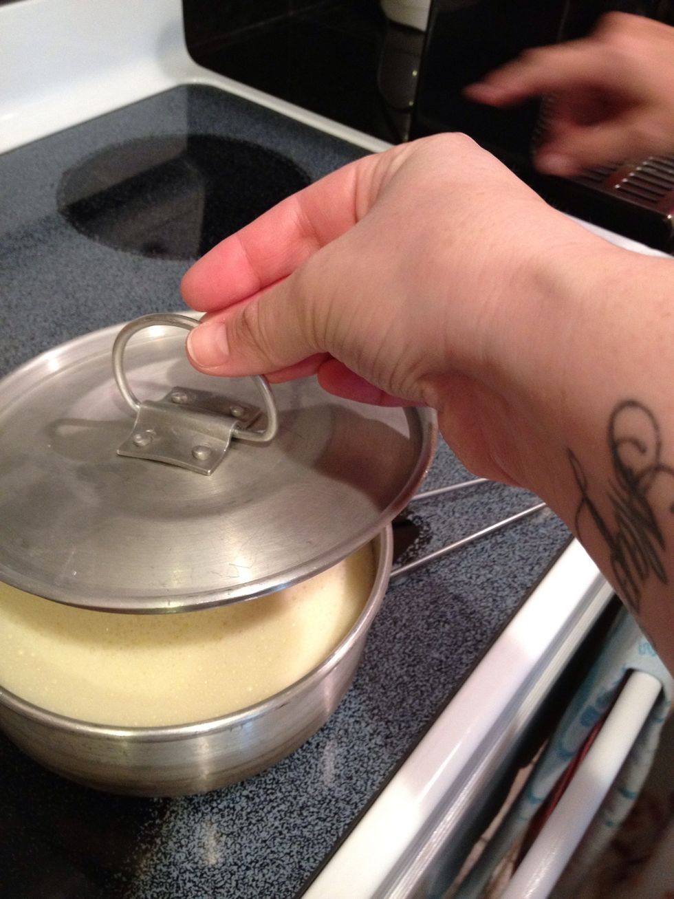 put lid on flanera pan and place into an inch of water in a larger pan creating a water bath.