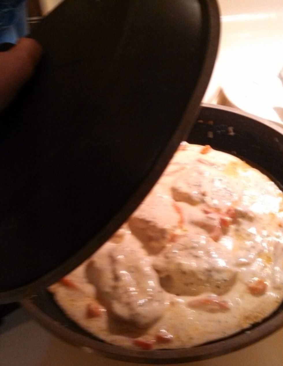 put lid on saucepan and cook until peppers and chicken are fully cooked and creme is warm.