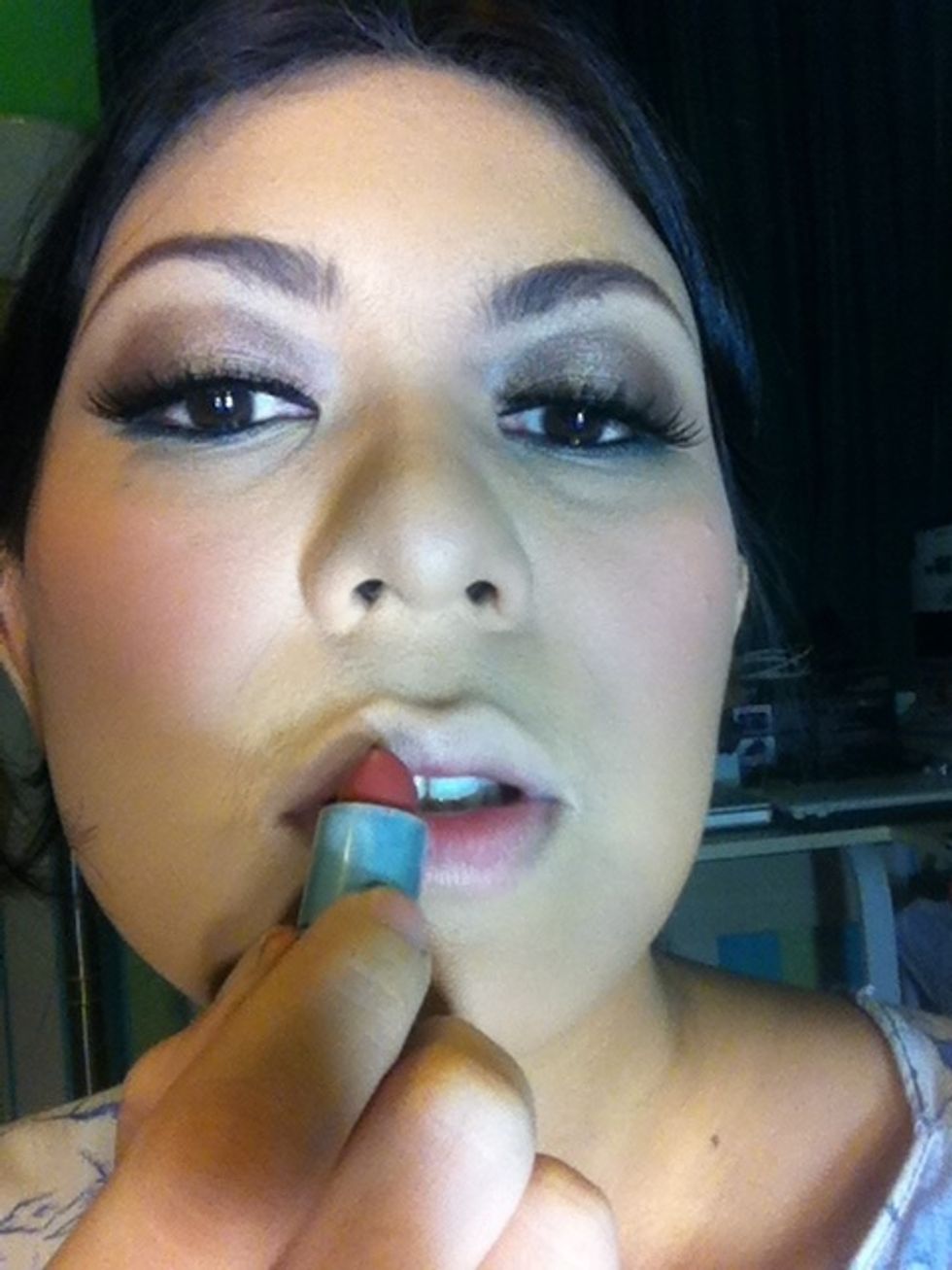 Put lipstick on, i choose MAC Retro for my lips to get natural color