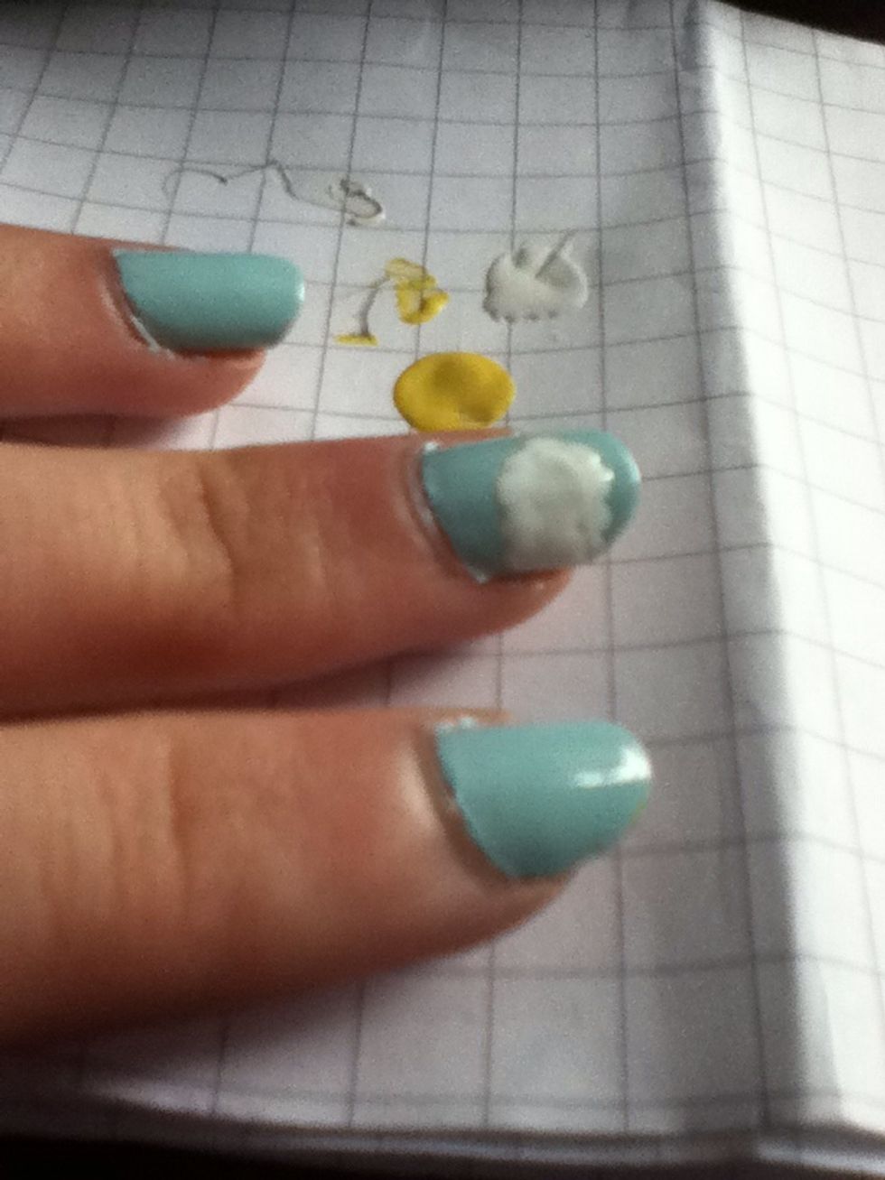 Put little white blobs to make a border and then fill it in with white to create a cloud.