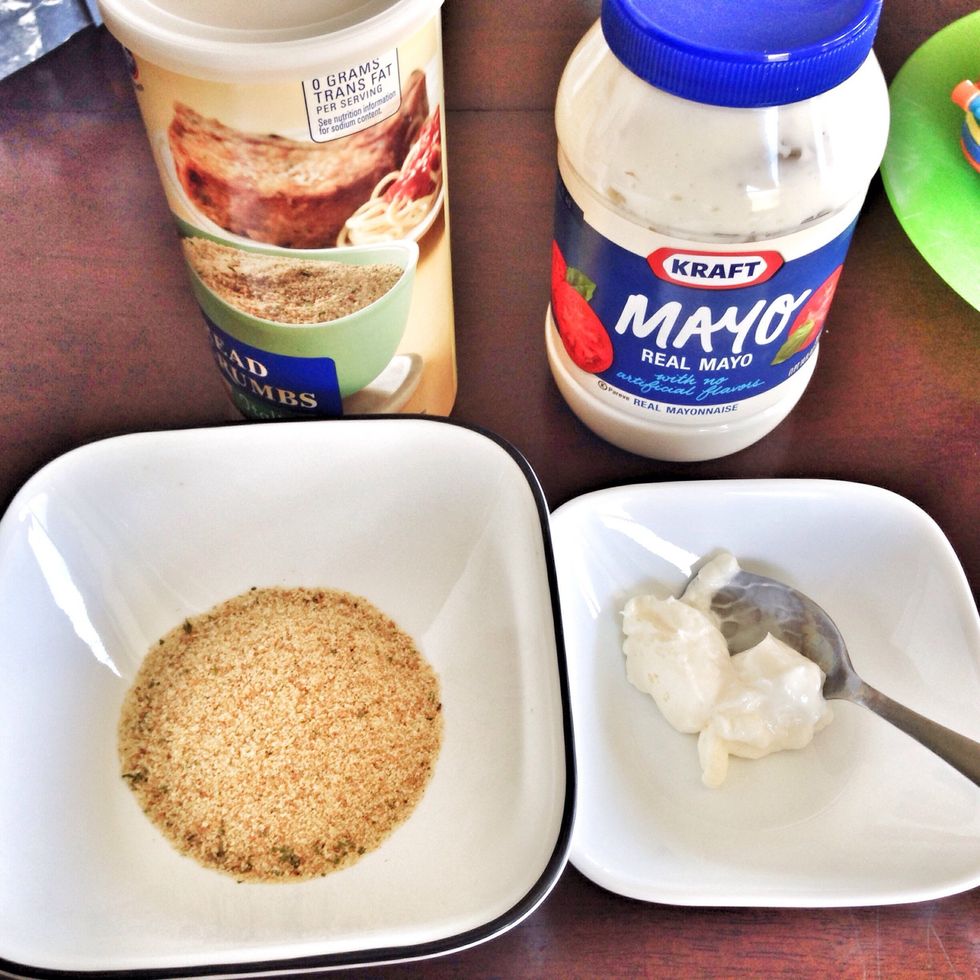 Put mayo in one bowl & dried bread crumbs in another.