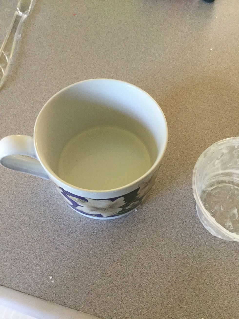 Put melted Vaseline into smaller container