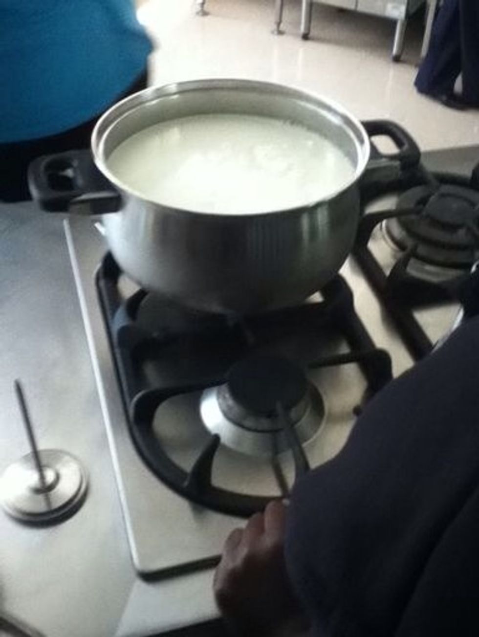 Put milk into pot.