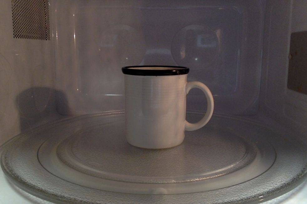 Put mug cake in the microwave for one minute.