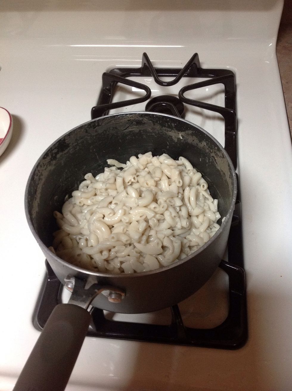 Put noodles in pot on top of burner.