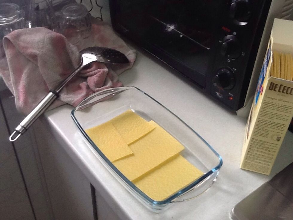 Put noodles on the bottom of the lasagne dish.