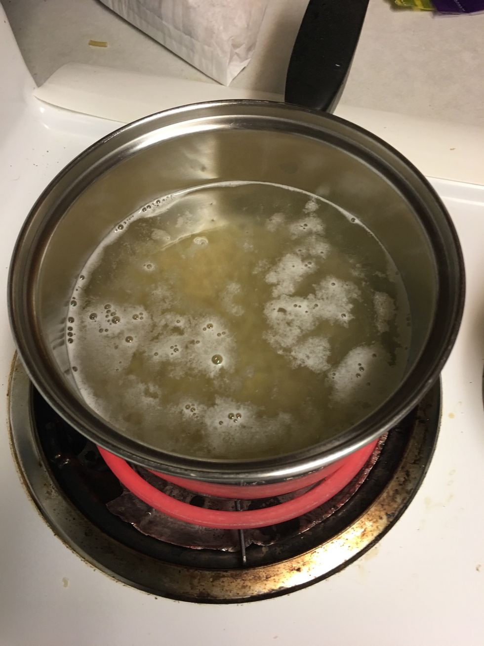 Put noodles with water in saucepan and cook on medium