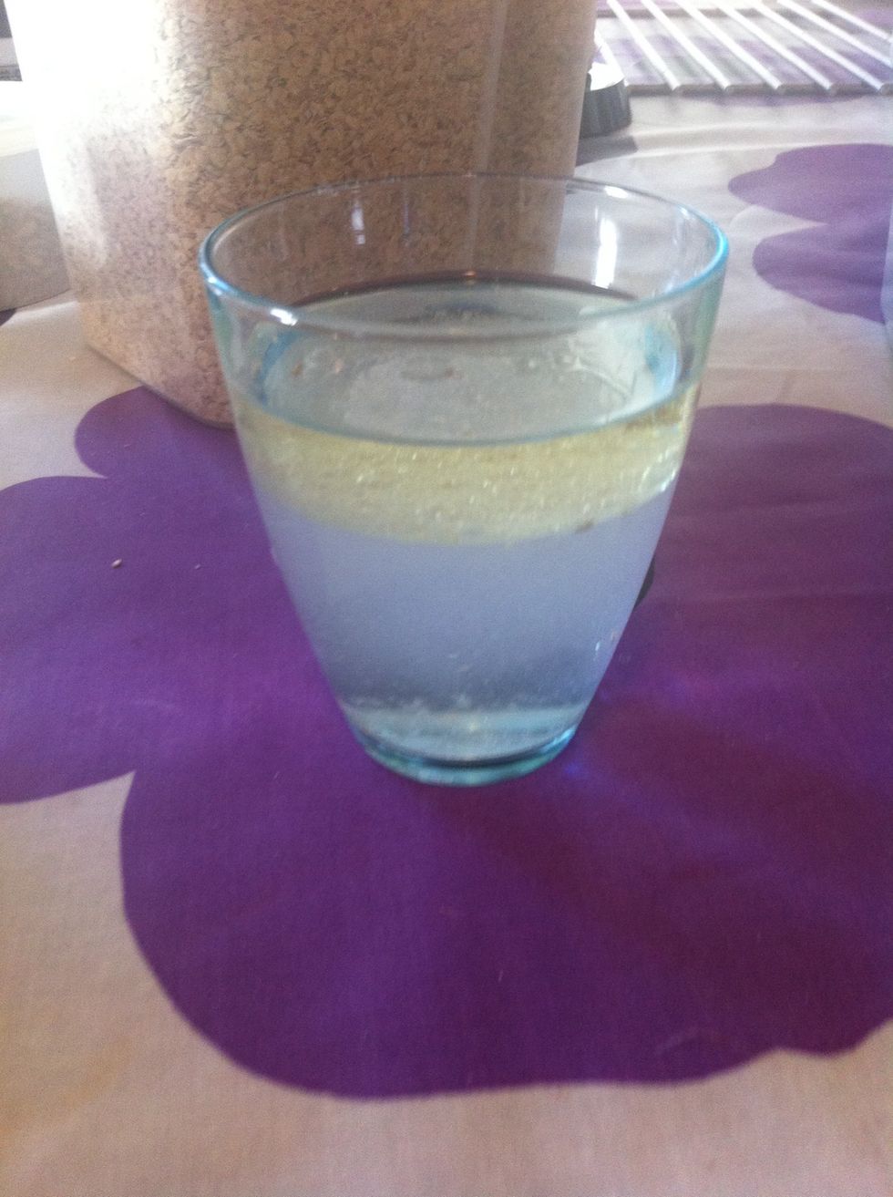Put oil and water together in a tall glass