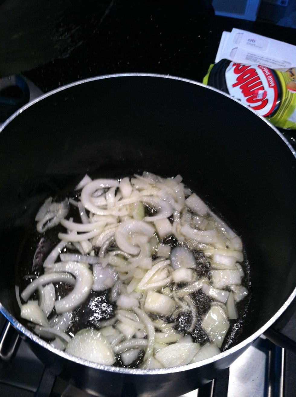 Put oil in deep dish, when oil gets hot add chopped onion