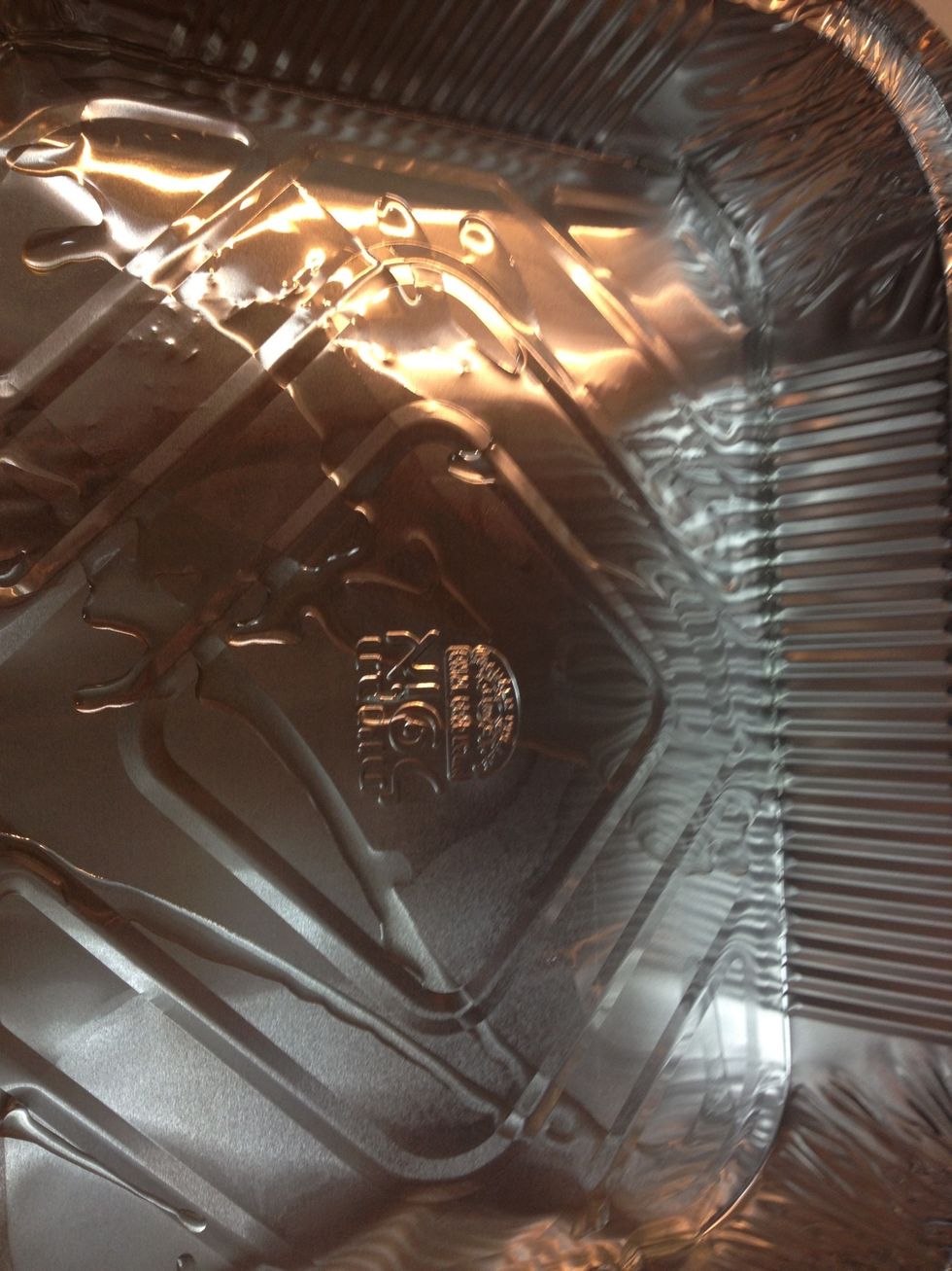 Put oil in the tray and tilt the tray from side to side so the oil will slide to almost all parts of the tray (it doesn't have to cover all)