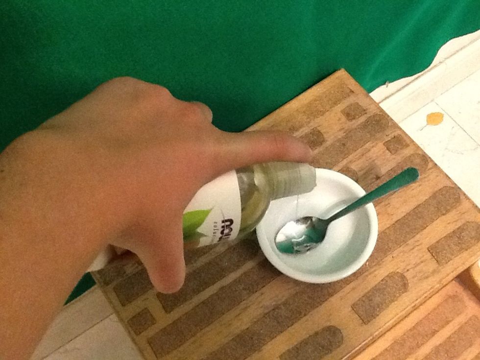 Put oil into dish