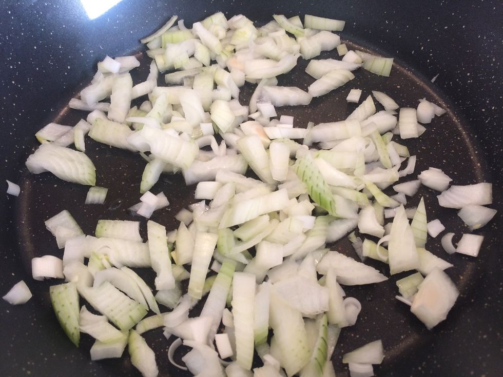 Put olive oil in pan and fry onions to brown colour