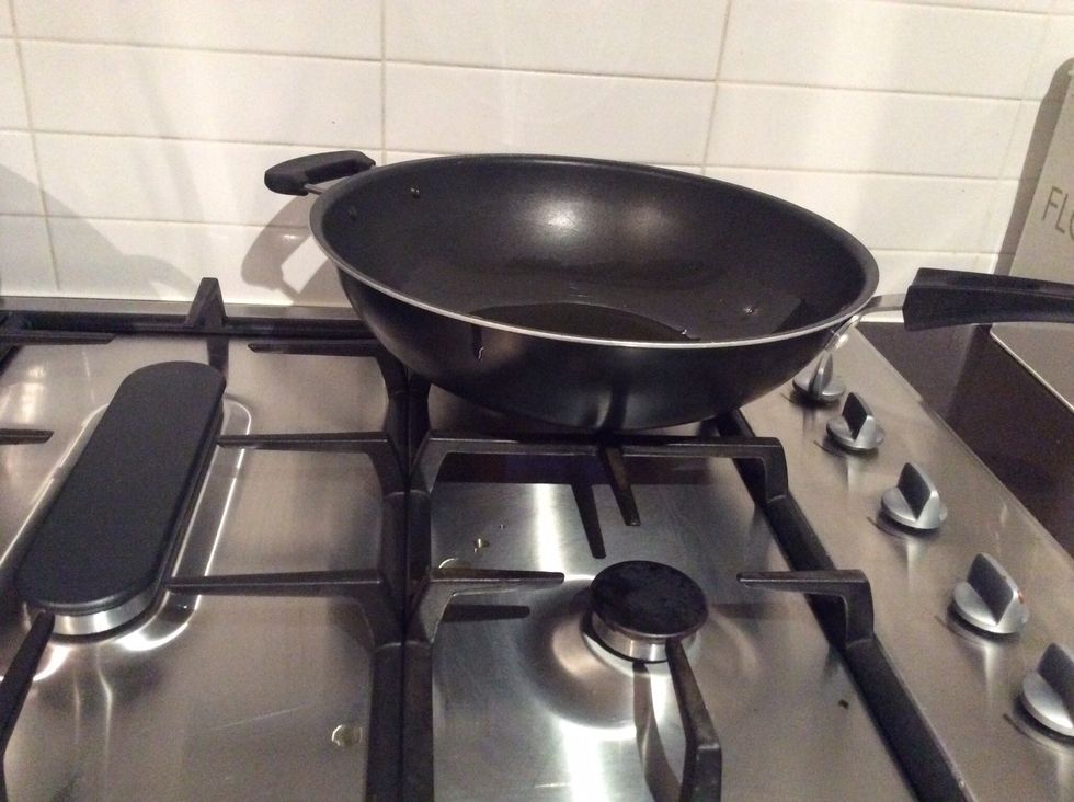 Put olive oil in the saucepan and turn on the stove.