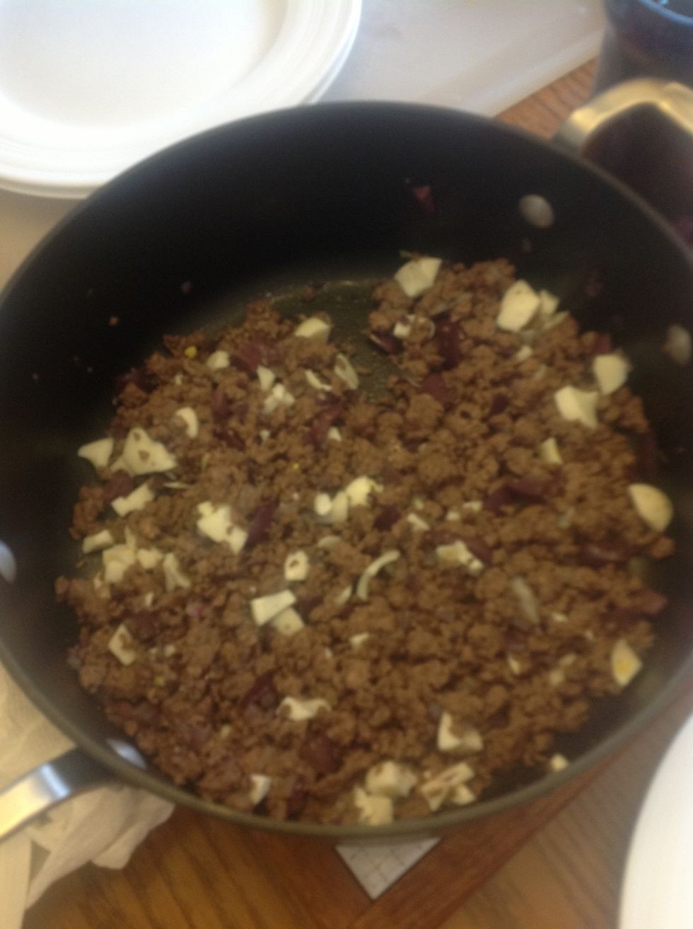 Put olives in mixture