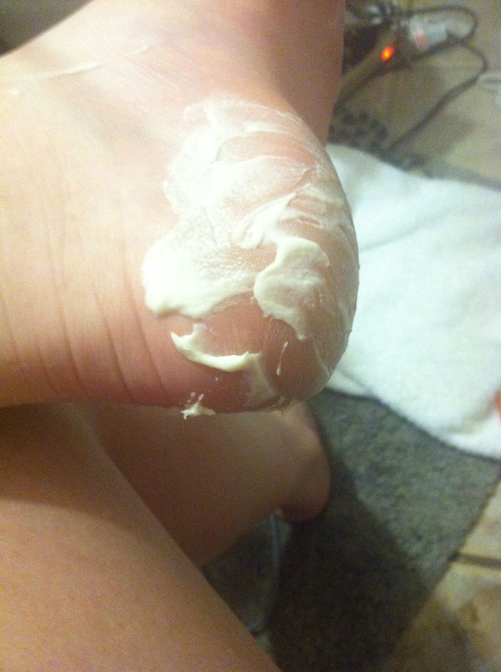 Put on a lot of lotion. Don't worry, it will absorb into your feet.