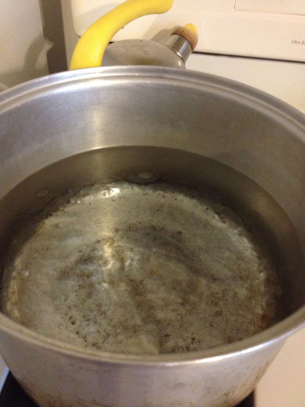 Put on a pot of water to boil - this is to cook the egg noodles. Add a dash of salt and a splash of olive oil to the water.