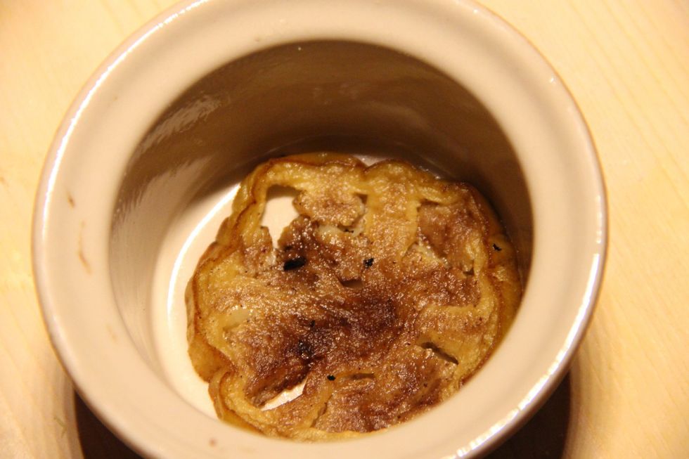 Put on bottom of pan a slice of eggplant
