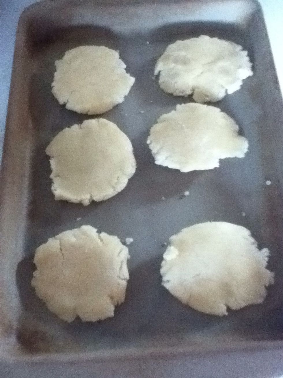 Put on cookie sheet, and bake at 350, for 20 mins (until light brown in color) (I used my hands to flatten the cookies down :))