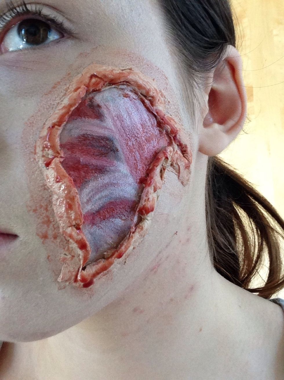 Put on fake blood around the edges
