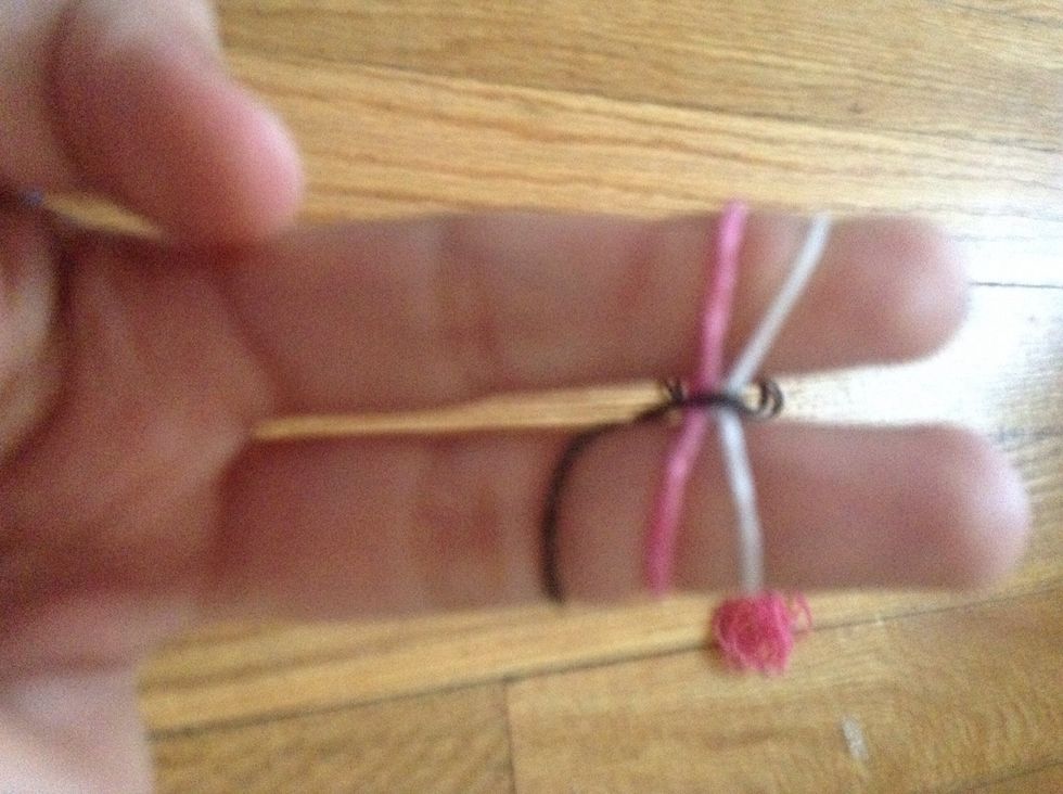 Put on half of the rubber band that was a figure 8
