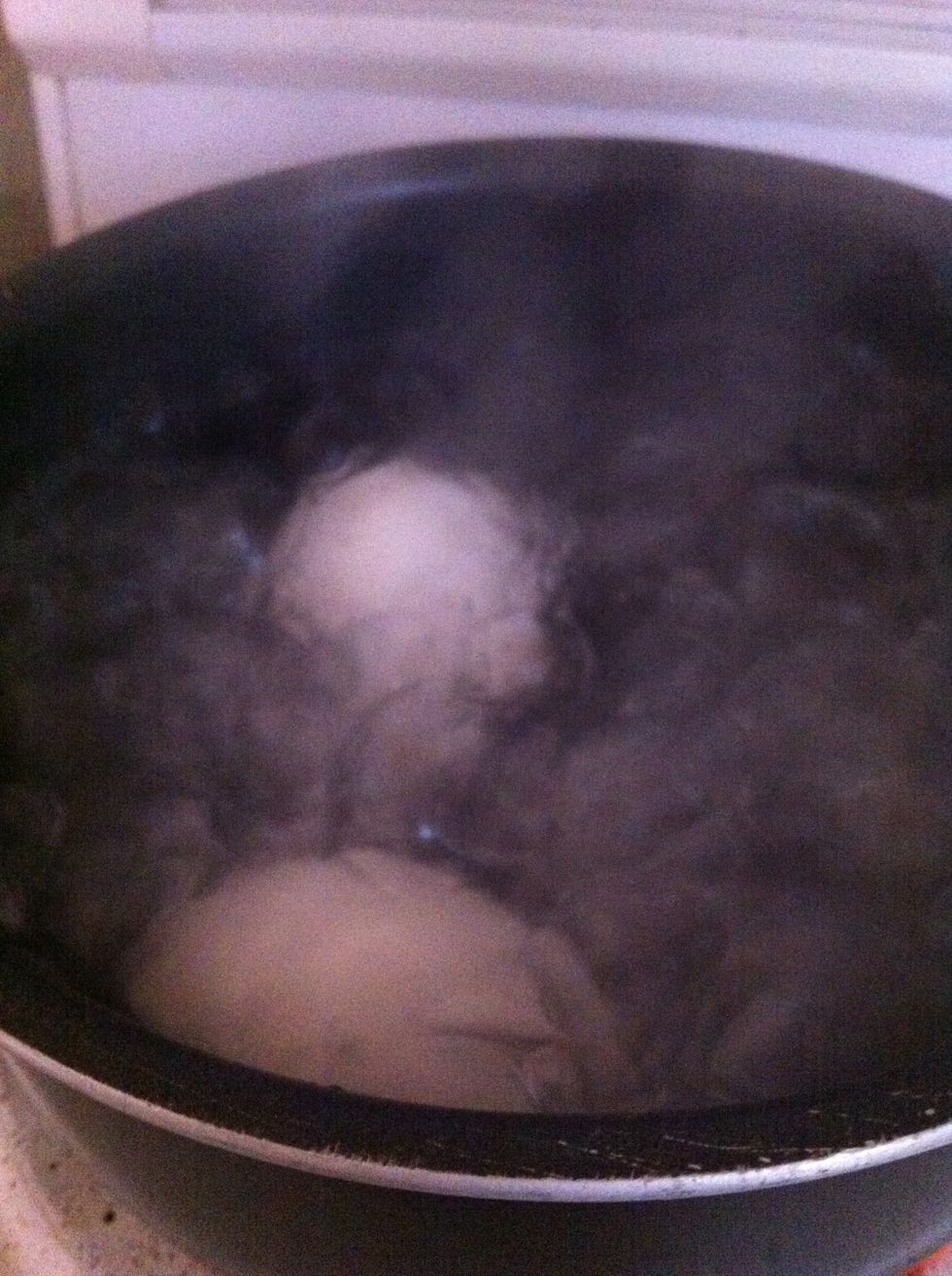 Put on maximum heat & bring to boiling. I leave them to boil about 3 minutes before turning the heat down by about half.