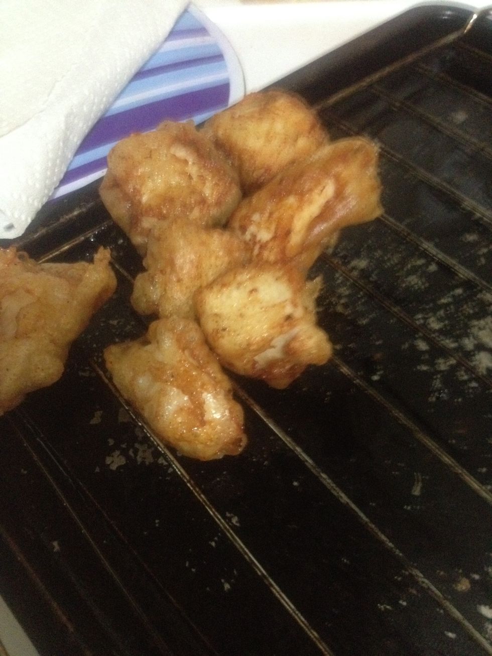 Put on rack to remove excess oil