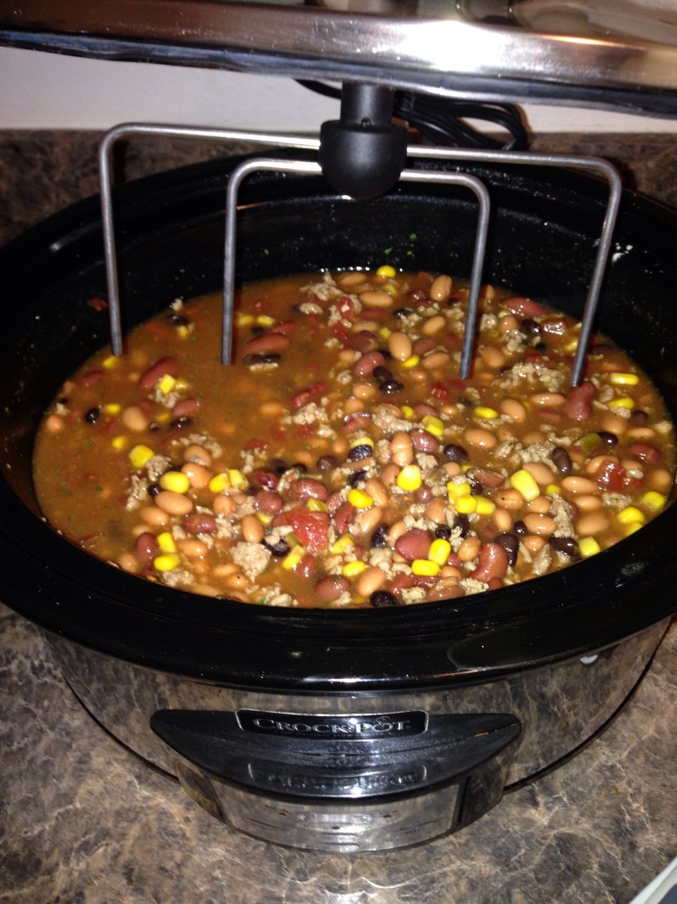 Put on the lid! The crock pot with a stirring attachment is awesome. Just make sure to use the silver paddle since it is a meatier dish.
