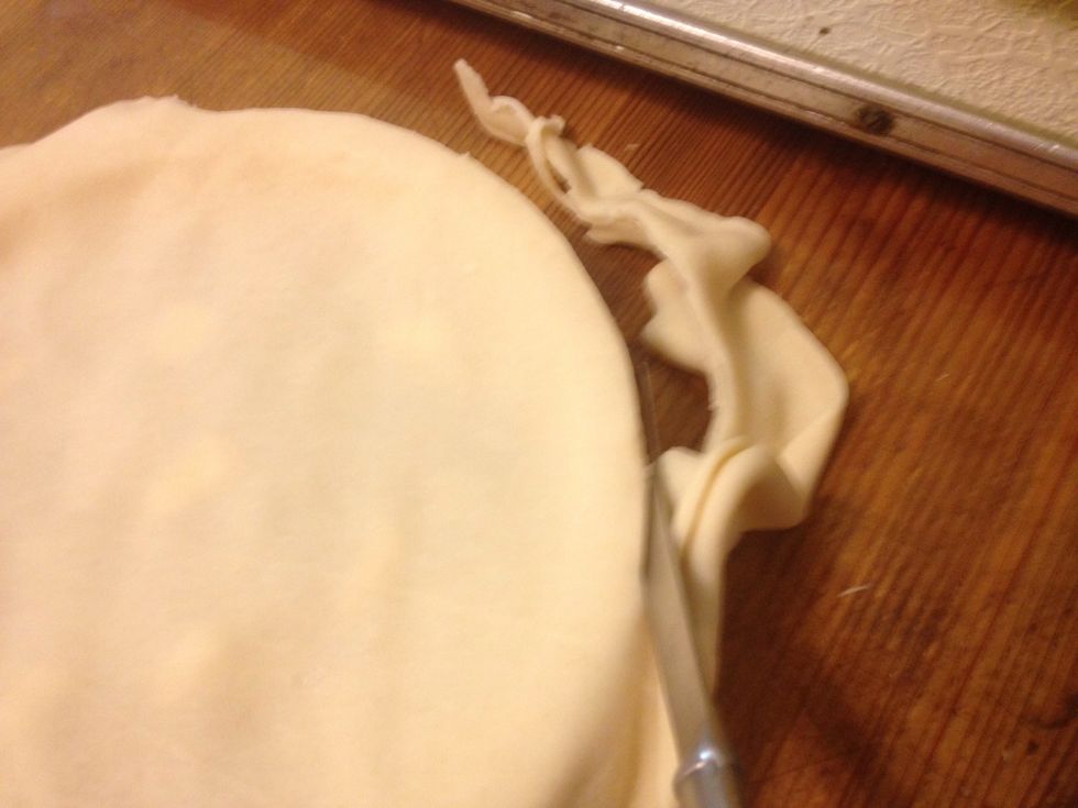 Put on the top crust and trim the excess.