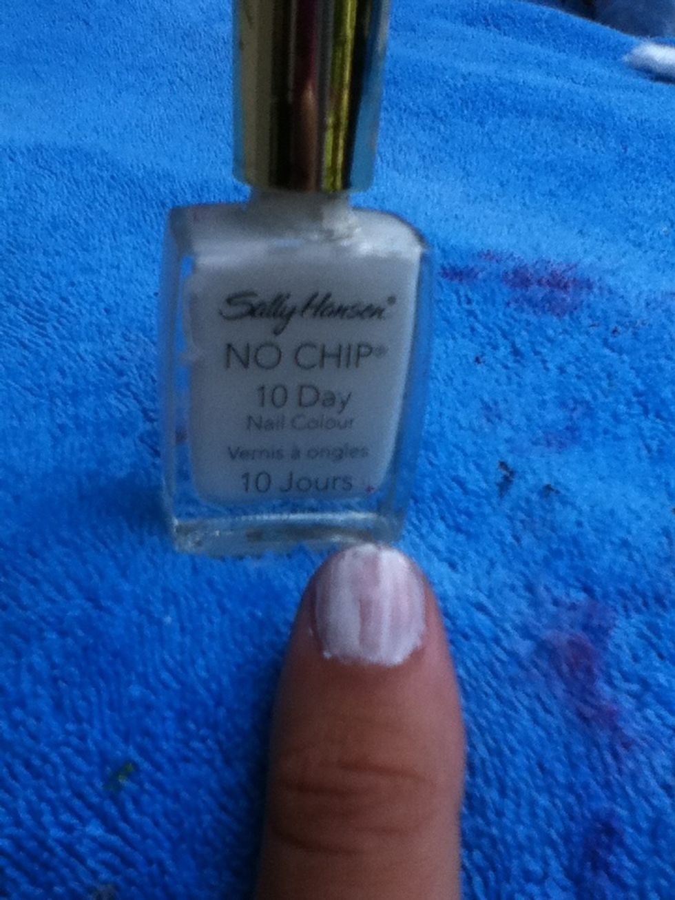 Put on two coats of white polish...