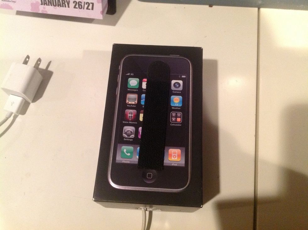 Put on what you will use to attach to wall (I used some Velcro-like straps because that's what I had)