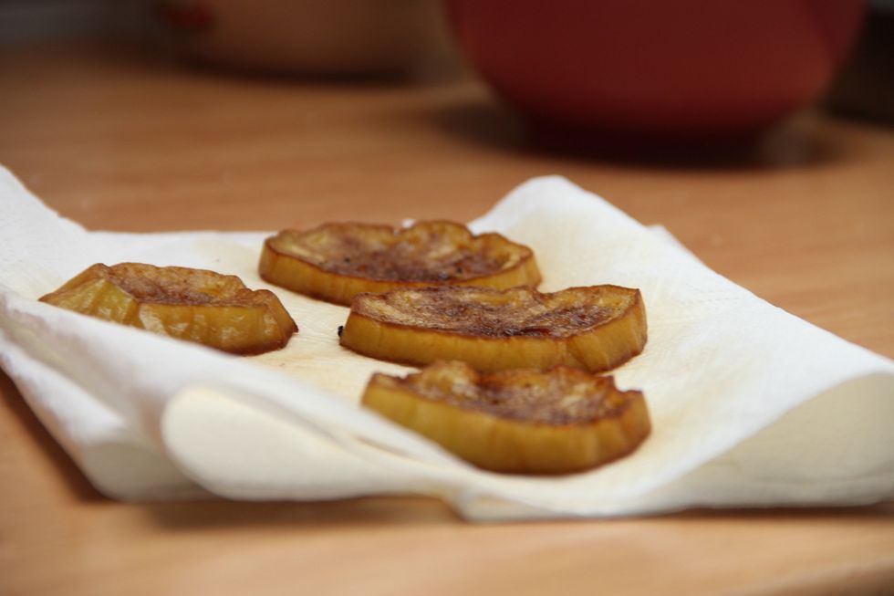 Put on white paper towl to drain excess oil