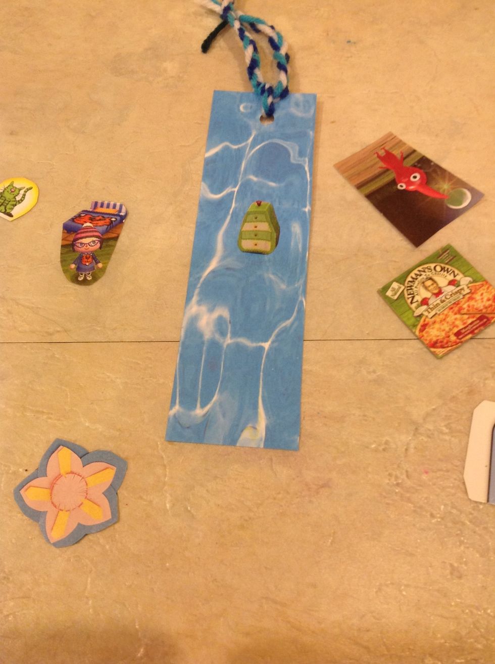 Put on your design with glue or tape