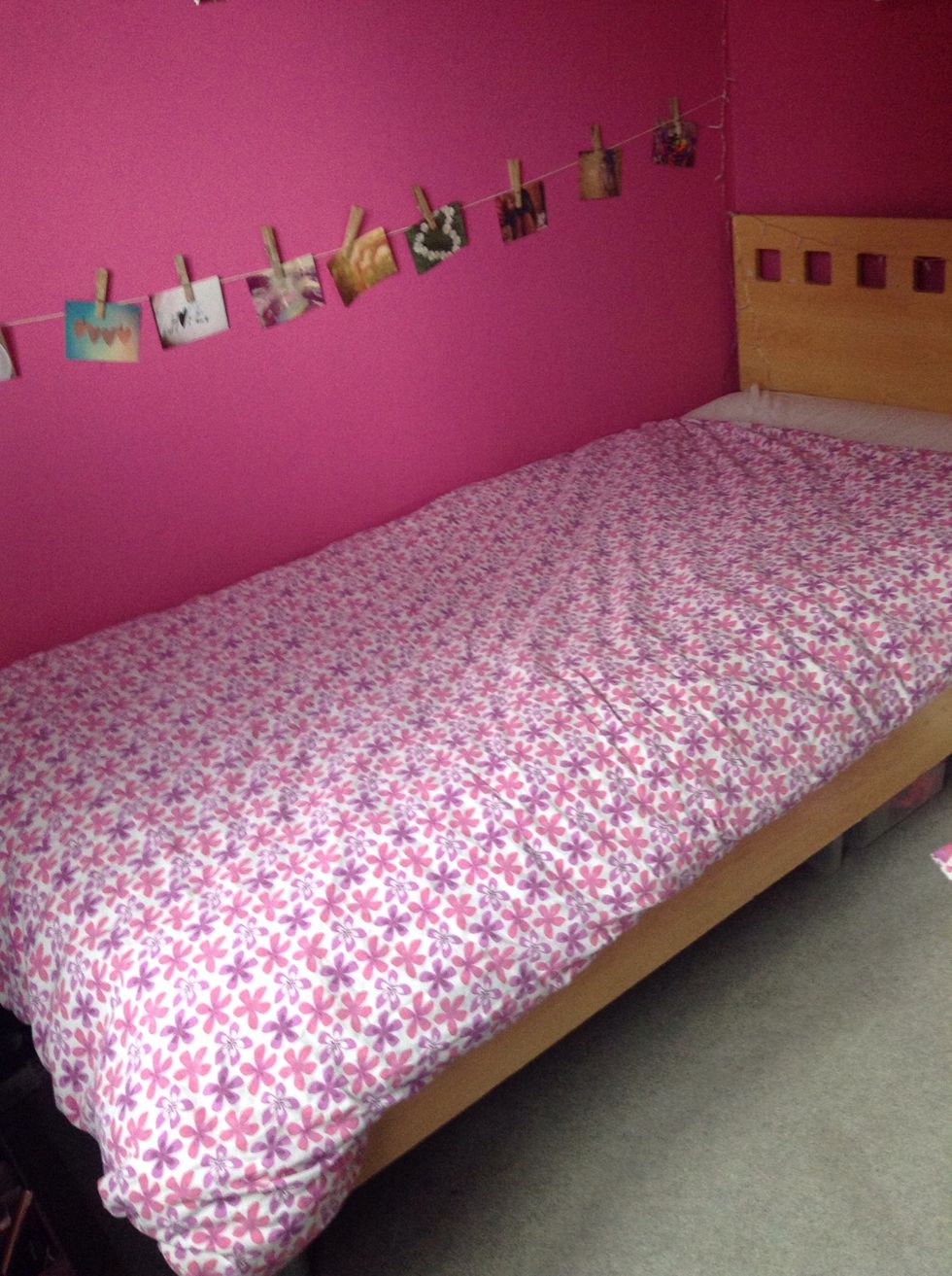 Put on your duvet cover and place neatly on your bed